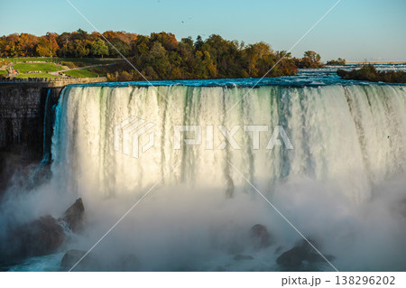 Niagara Falls panoramic view with powerful water curtain and rising mist 138296202