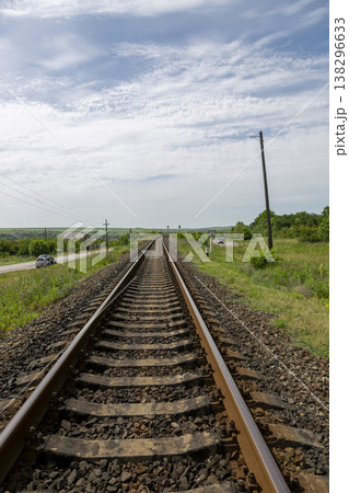 A fragment of a railroad track with rails 138296633
