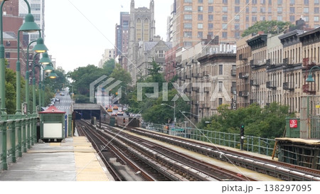 New York City Manhattan subway outdoor station platform, 125 street, elevated metro in Harlem, USA. 138297095