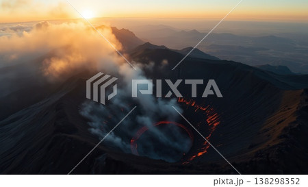 Aerial view of a steaming volcanic crater at sunrise, with glowing lava visible in the depths of the caldera. Aerial view of a steaming volcanic crater at sunrise, with glowing lava visible in the depths of the caldera. 138298352