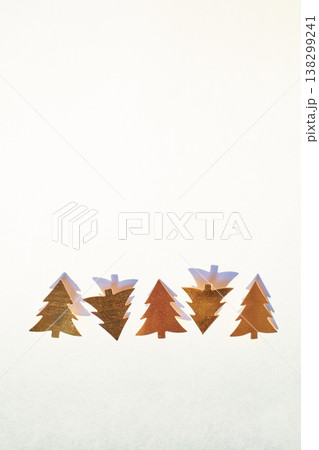 Gold Christmas Tree Cutouts Arranged On White Background For Holiday Decoration Ideas 138299241