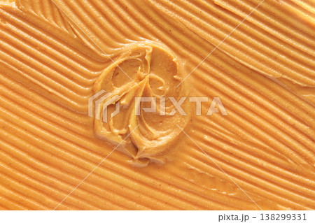 Smooth Swirl Of Creamy Peanut Butter With Textured Ripples In Golden Color Palette Smooth Swirl Of Creamy Peanut Butter With Textured Ripples In Golden Color Palette 138299331