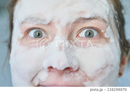 Caucasian adult female with facial mask for skincare routine and relaxation concept Caucasian adult female with facial mask for skincare routine and relaxation concept 138299870