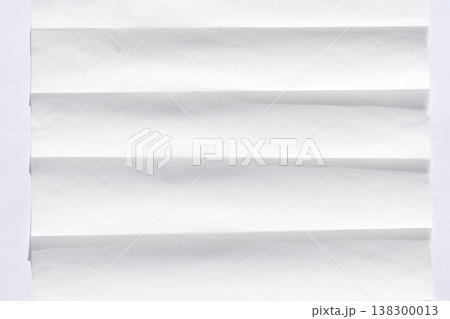 White folded paper texture with horizontal creases for background or abstract design use White folded paper texture with horizontal creases for background or abstract design use 138300013