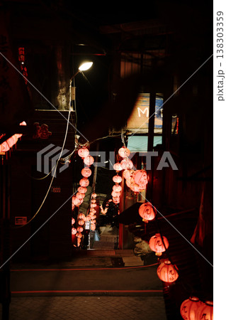 Red Lanterns Glowing in Jiufen Old Street Alley at Night 138303359