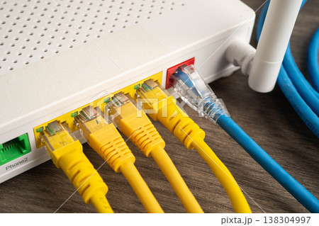 Ethernet cable with wireless router connect to internet service provider network. Ethernet cable with wireless router connect to internet service provider network. 138304997