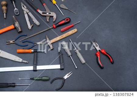 Hand Tools set top view. Professional DIY different Equipment for household. Assorted work and home renovation tool flat lay Hand Tools set top view. Professional DIY different Equipment for household. Assorted work and home renovation tool flat lay 138307824