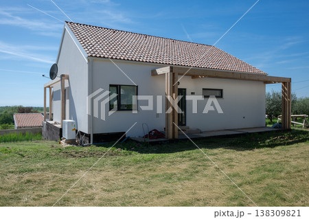 Modern modular minimalistic house with energy-efficient heating and cooling and solar-ready design in rural setting Modern modular minimalistic house with energy-efficient heating and cooling and solar-ready design in rural setting 138309821