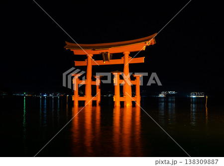 Itsukushima Shrine torii illuminated at night on Miyajima island Itsukushima Shrine torii illuminated at night on Miyajima island 138309887