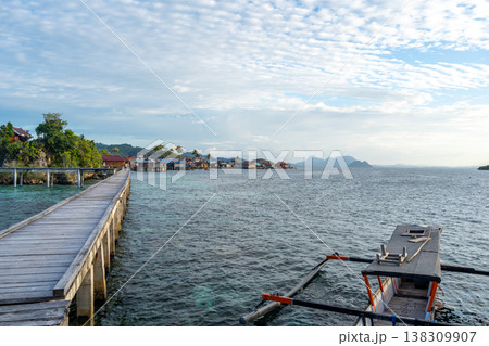 Wooden jetty to Bajo village, Pulau Papan, Sulawesi, Indonesia 138309907