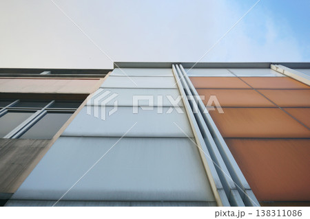 Modern apartment building exterior, detail of a modern wall building, architecture. 138311086