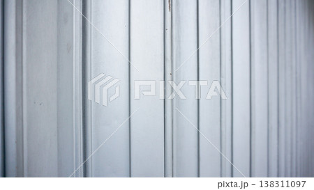 close up of white corrugated metal sheet texture or background. 138311097