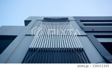 Modern office building exterior. Architectural detail of modern office building. Modern office building exterior. Architectural detail of modern office building. 138311105
