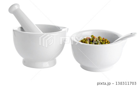 White glazed ceramic mortar and pestle.White glazed ceramic mortar and pestle. White glazed ceramic mortar and pestle.White glazed ceramic mortar and pestle. 138311703