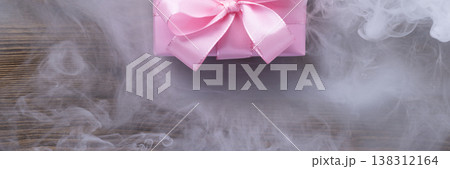 gift banner with pink box and smoke 138312164