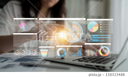 Innovative Data Analysis with Interactive Graphs and Charts on Laptop for Business Insights and Decision Making in Modern Office Environment Ledger 138313486