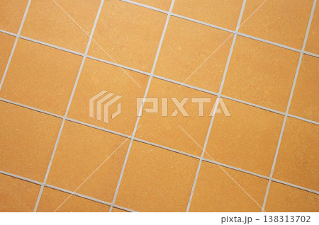 Orange ceramic tile background in a minimalist style. Interior design concept. 138313702