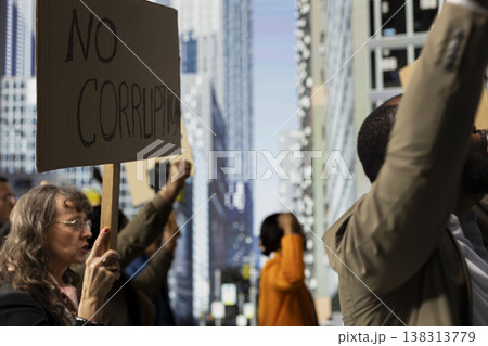 Public demonstration shows people united in activism against corruption, law misconduct and censorship, demanding democracy and equal rights. Non-violent protest and political action. Public demonstration shows people united in activism against corruption, law misconduct and censorship, demanding democracy and equal rights. Non-violent protest and political action. 138313779