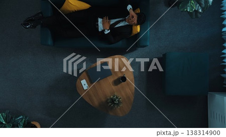 Top view of stressful manager talking to smart team by using phone. Directorate. Top view of stressful manager talking to smart team by using phone. Directorate. 138314900