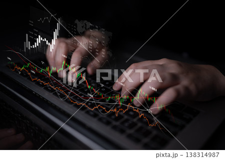 Hands on Laptop Keyboard Analyzing Stock Market Data with Financial Graphs and Charts in Dark Environment for Business and Investment Concept Scalp Hands on Laptop Keyboard Analyzing Stock Market Data with Financial Graphs and Charts in Dark Environment for Business and Investment Concept Scalp 138314987