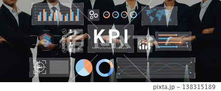 Group of business professionals presenting Key Performance Indicator data and analytics through digital dashboard with charts and graphs in modern office setting Gantry Group of business professionals presenting Key Performance Indicator data and analytics through digital dashboard with charts and graphs in modern office setting Gantry 138315189
