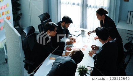 Top view of business people brainstorm idea by using sticky notes. Directorate. 138315646