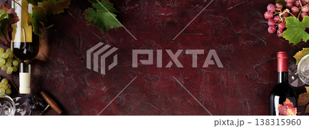 Red Wine Bottles and Glass with Grapevine on Rustic Background Red Wine Bottles and Glass with Grapevine on Rustic Background 138315960