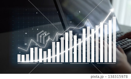 Clear graph displaying increasing growth trend with currency symbols overlaid on keyboard, illustrating financial analysis and digital business concepts Copula 138315978