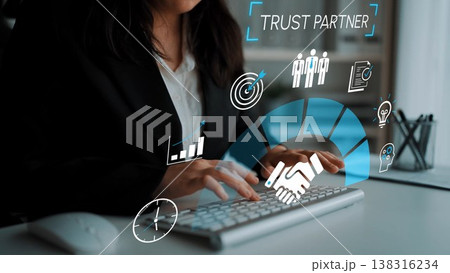 Business professional engaging in digital partnership collaboration with futuristic graphical elements showcasing trust and teamwork for stock photo use Gluon Business professional engaging in digital partnership collaboration with futuristic graphical elements showcasing trust and teamwork for stock photo use Gluon 138316234