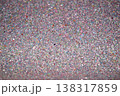 Colorful glitter texture background with sparkling particles in various shades and sizes 138317859