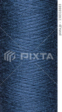 macro texture of a skein of blue sewing thread 138318883