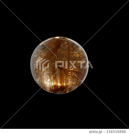 Ball of quartz with rutile on a black background 138318898