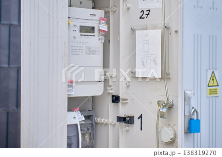 Open electrical utility box with digital electricity meter Open electrical utility box with digital electricity meter 138319270