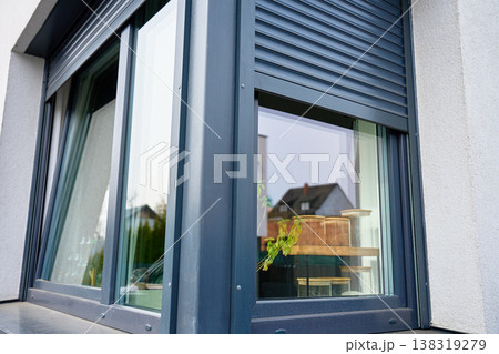 Modern house window with external roller shutter Modern house window with external roller shutter 138319279