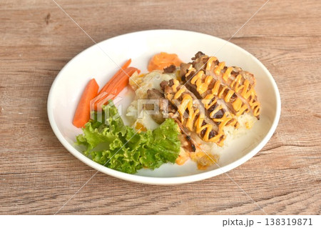 grilled chicken dressing cheese with fried cream egg omelet and vegetable salad on rice in plate 138319871