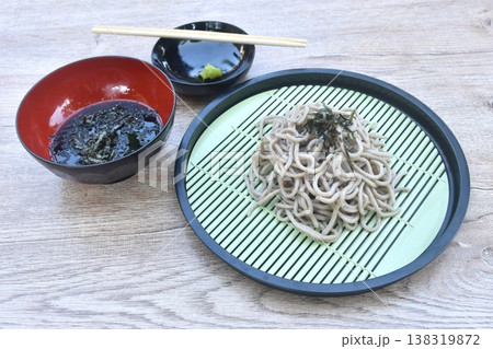 boiled cold yakisoba or zuru soba Japanese noodles topping dry slice seaweed on plate dipping soy sauce boiled cold yakisoba or zuru soba Japanese noodles topping dry slice seaweed on plate dipping soy sauce 138319872