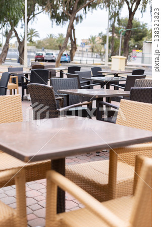 Empty cafe in the park, no people. Selective focus. Empty cafe in the park, no people. Selective focus. 138321823