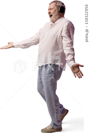 Senior man shocked reaction wearing headphones isolated white background Senior man shocked reaction wearing headphones isolated white background 138322958