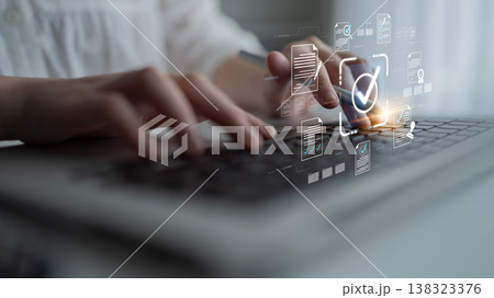 Professional hand typing on laptop keyboard with digital interface displaying check marks, documents, and technology icons for business and productivity concepts Sigmoid. Professional hand typing on laptop keyboard with digital interface displaying check marks, documents, and technology icons for business and productivity concepts Sigmoid. 138323376