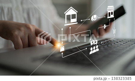 Concept of Digital Shopping Experience with Icons Representing Online Transactions and Hand Interacting with Smartphone and Laptop Ledger Concept of Digital Shopping Experience with Icons Representing Online Transactions and Hand Interacting with Smartphone and Laptop Ledger 138323385