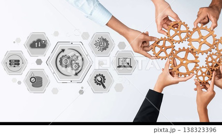 Hands unite to hold wooden gears, representing teamwork and innovation amidst digital icons in a modern workspace, showcasing collaboration and technological synergy. Sigmoid Hands unite to hold wooden gears, representing teamwork and innovation amidst digital icons in a modern workspace, showcasing collaboration and technological synergy. Sigmoid 138323396
