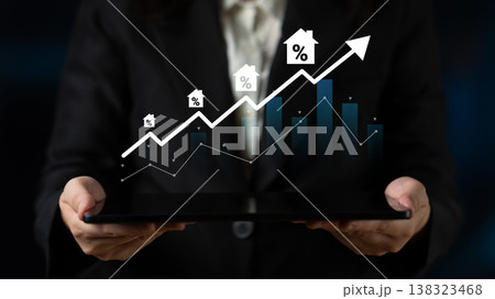 Business growth analysis concept with graph, house icons, and digital tablet reflecting increasing values in real estate market trends and investments Gantry 138323468