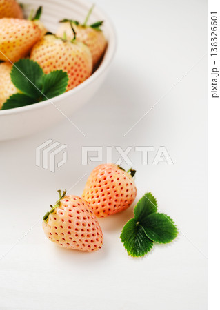 White pink strawberry, berry fruits with leaves on white background, copy space 138326601