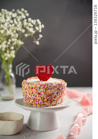Valentine's Day, Love, festive cake with red heart and gypsophila flowers Valentine's Day, Love, festive cake with red heart and gypsophila flowers 138326716