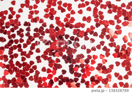 Hearts sequins on a white background, flat lay top view 138326789