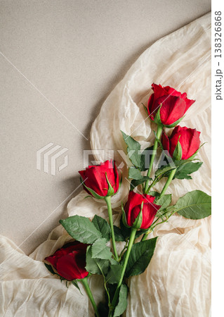 Mother's Day or Valentine's Day background. Red rose flowers on neutral background. Greeting card template, copy space Mother's Day or Valentine's Day background. Red rose flowers on neutral background. Greeting card template, copy space 138326868