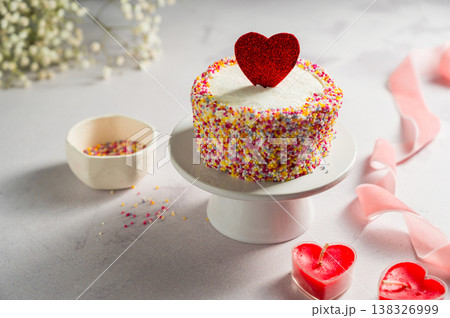 Valentine's Day, Love, festive cake with red heart and gypsophila flowers 138326999