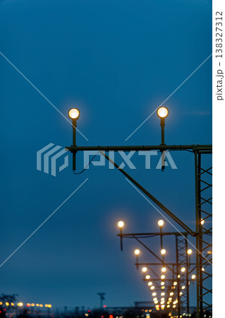 Close up of airfield landing light poles 138327312