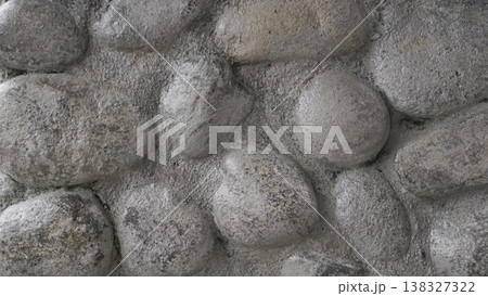 background of cemented rocks on the wall 138327322