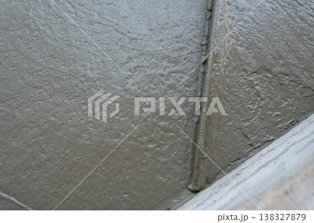 Concrete surface installation process construction site image industrial setting close-up view building techniques 138327879
